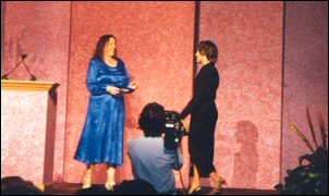 Author Julia Justiss receiving a Goldenheart